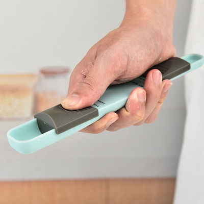Doseur extrémité réglable en plastique de doseur de cuisine de double