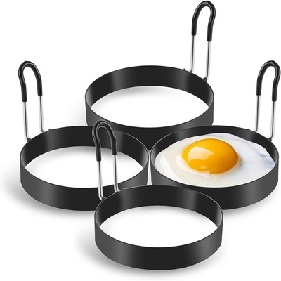 Oeuf rond noir d'acier inoxydable faisant cuire des anneaux modernes