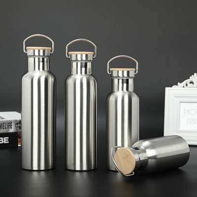 Bouteille de sport isolée en argent à double paroi en acier inoxydable de 12 oz avec couvercle en bois