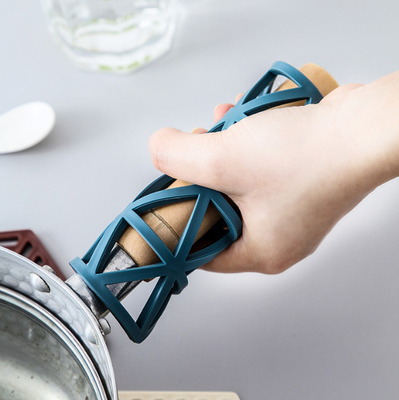 Outil multifonctionnel de cuisine de la chaleur d'hexagone de tapis de trépied de silicone et de protections chaudes pour des tapis de cuvette