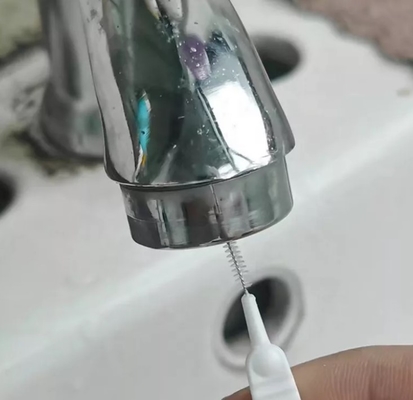 Poignée en plastique Mini Cleaning Brush de téléphone de trou de débouché de pommeau de douche d'articles de ménage