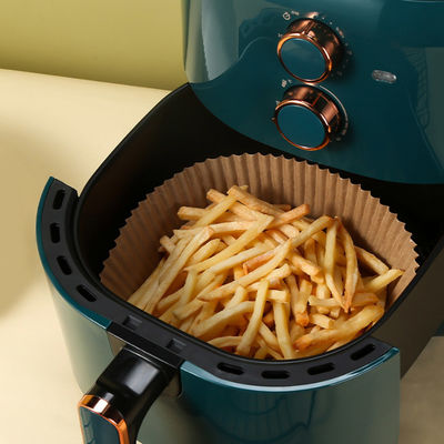 Revêtement de papier jetable de friteuse d'air autour de faire cuire le papier de cuisson à l'épreuve des huiles