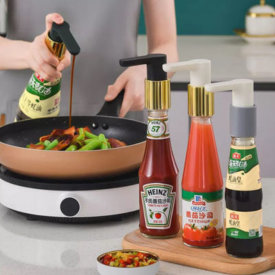 Pompe étanche de distributeur de sauce à huître de bouteille de presse de main de compression d'outils de cuisine
