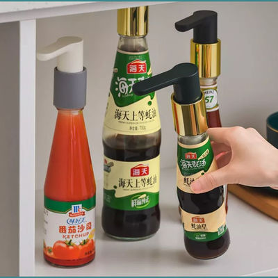 Pompe étanche de distributeur de sauce à huître de bouteille de presse de main de compression d'outils de cuisine