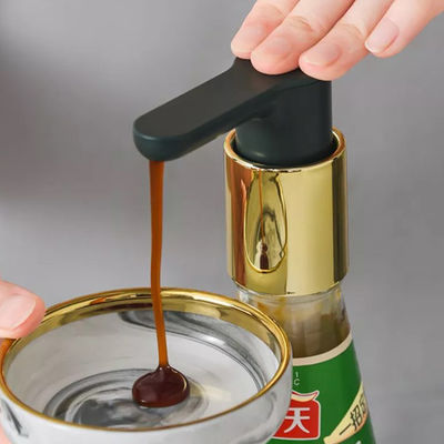 Pompe étanche de distributeur de sauce à huître de bouteille de presse de main de compression d'outils de cuisine