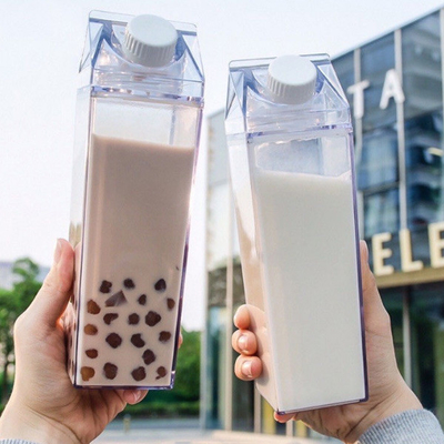 les tasses faites sur commande de boissons de la place 500ml en plastique traient la bouteille d'eau de carton étanche