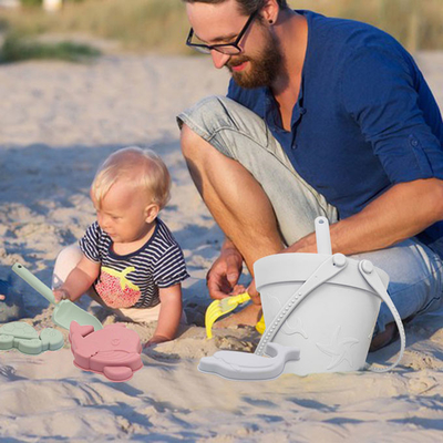 Seau unisexe de sable de mer de silicone d'été d'enfant réglé pour la plage