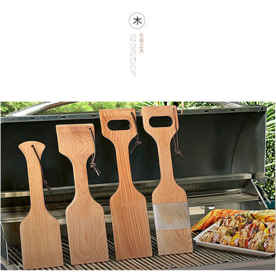 Les outils et les accessoires en bois naturels libres de BARBECUE de poil grillent le grattoir