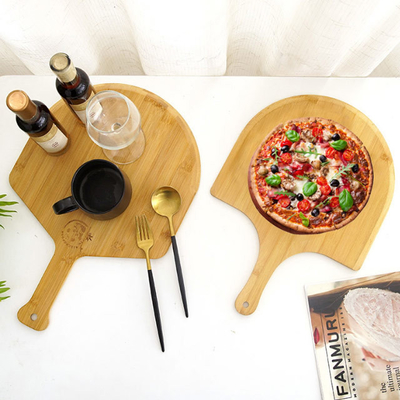 Panneau en bambou naturel de la meilleure qualité de peau de pizza de boulangerie avec les bords et la poignée faciles de glissement