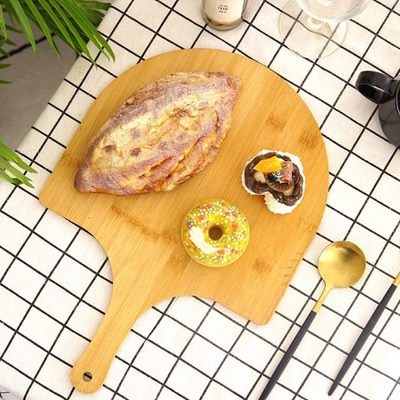 Panneau en bambou naturel de la meilleure qualité de peau de pizza de boulangerie avec les bords et la poignée faciles de glissement