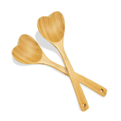 Cuillère en bambou en forme de coeur en bois gravée pour faire cuire la cuillerée d'amour