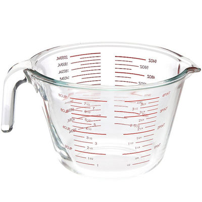 Tasse de mesure en verre de cuisson de cuisine avec les graphiques rouges micro-onde et four